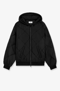 Celine men’s black quilted jacket with diamond stitching hood and front zipper for stylish cold weather wear