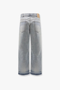 Celine men’s Wesley Zuma wash light-wash denim jeans with wide-leg cut and frayed hems in front view