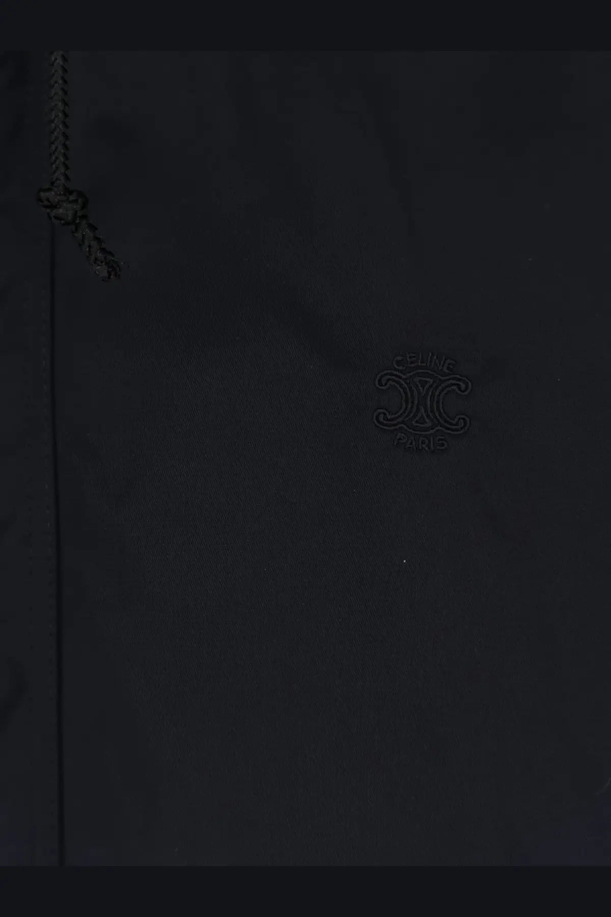 Dark navy celine paris logo embroidered on textured fabric of black windproof nylon jacket for men