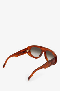 Celine women’s tortoiseshell acetate sunglasses with gradient gray lenses and a sculpted frame design in brown