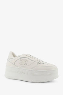 White celine women’s block sneaker featuring a sleek leather upper and embossed logo on the side