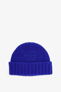 Vibrant royal blue ribbed knit beanie with folded cuff and embroidered logo made of cashmere and silk by Celine