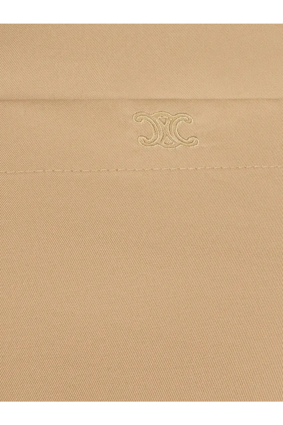 Beige celine women’s cotton and silk dress with subtle embroidered logo on soft cotton fabric close up