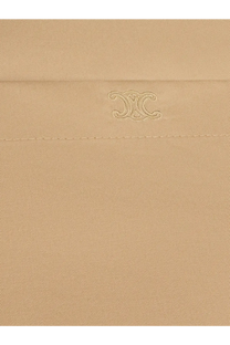 Beige cotton and silk dress by celine featuring subtle embroidered logo on beige cotton fabric