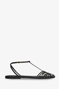 Celine women’s black leather flat sandal with t-strap woven toe detail and gold-tone hardware accents