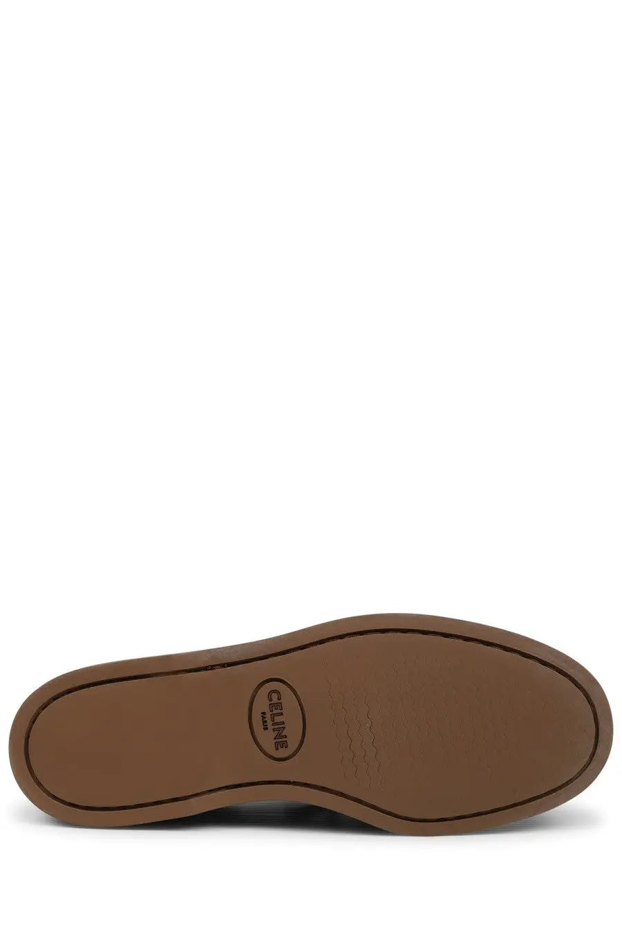 Brown rubber sole with circular celine paris logo embossed in the center of celine women’s bateau beige shoe