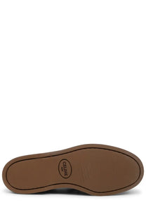Brown rubber sole with circular celine paris logo embossed in the center of celine women’s bateau beige shoe