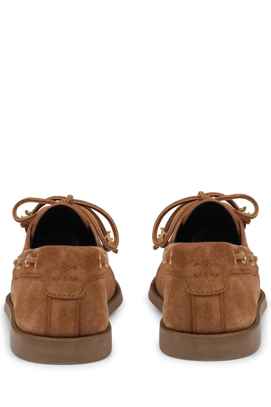 Tan suede celine women’s bateau beige boat shoes with gold-tone eyelets and embossed logo on the heel back side