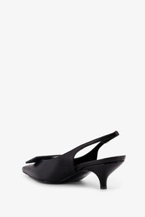 Celine women’s black patent leather slingback pumps with pointed toe and small bow detail at the front