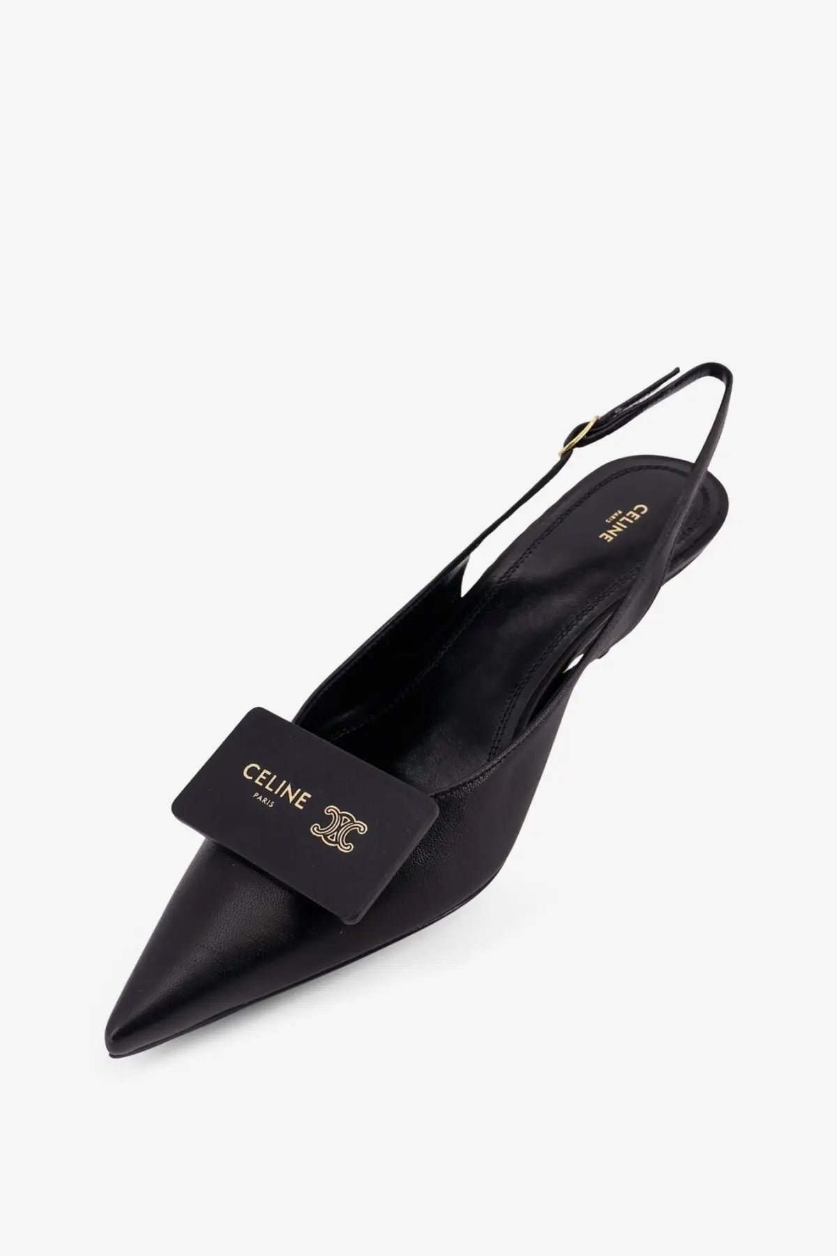 Black celine women’s signature leather pointed-toe slingback pump with gold-tone logo plaque on the toe