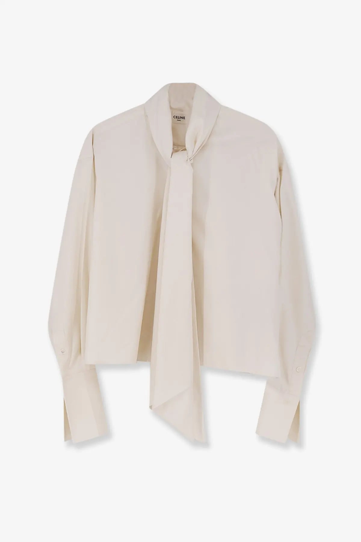 Cream-colored celine women’s silk blouse with distinctive draped front and long sleeves in white