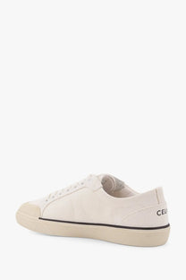 Celine women’s triomphe canvas sneakers white cream low-top with black stitching and matching rubber sole