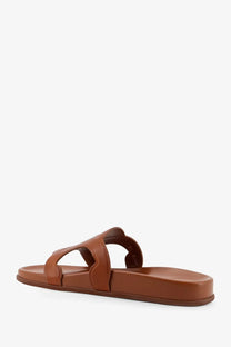 Celine women’s triomphe beige leather slide sandal with minimalist two-strap design