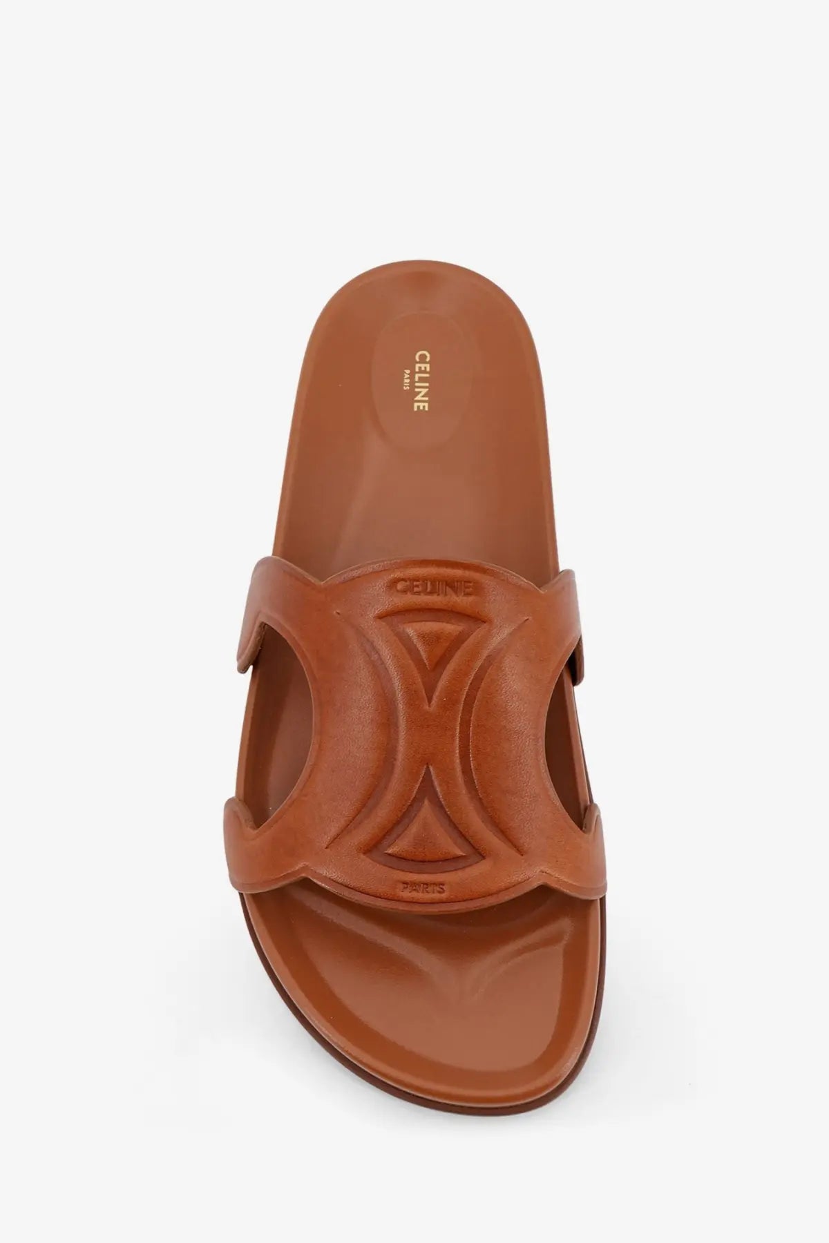 Brown leather Celine women’s Triomphe slide sandal with beige embossed x-shaped strap design