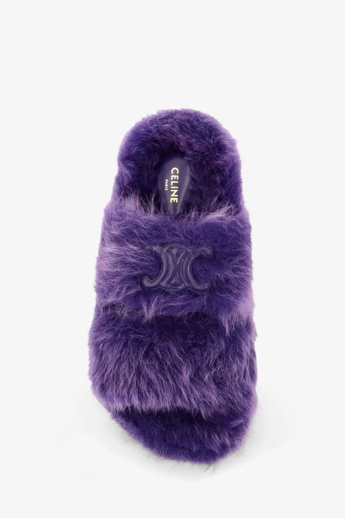 Purple faux fur celine triomphe slide shearling sandal with plush textured surface and embossed logo on strap