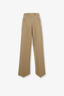 Beige wide-leg celine women’s wool and cotton trousers with tailored fit and subtle front pleats