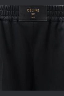 Celine women’s black wool shorts with sleek smooth fabric and elastic waistband for comfortable wear