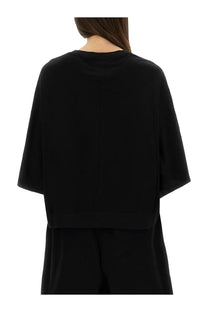 Black minimalist cropped top with loose short sleeves and rounded neckline from Champion x Rick Owens women’s collection