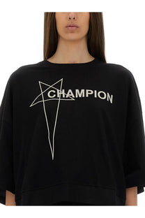 Black champion sweatshirt with white champion lettering and star graphic from champion x rick owens women’s cropped tommy shirt
