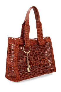 Chloé women’s borsa tote summer banana east west brown woven rust straw bag with brown leather handles and gold logo charm