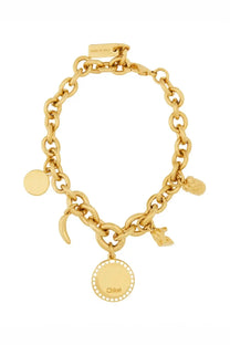 Gold-toned chain bracelet by Chloé with multiple charms including engraved disc and leaf and crescent pendants