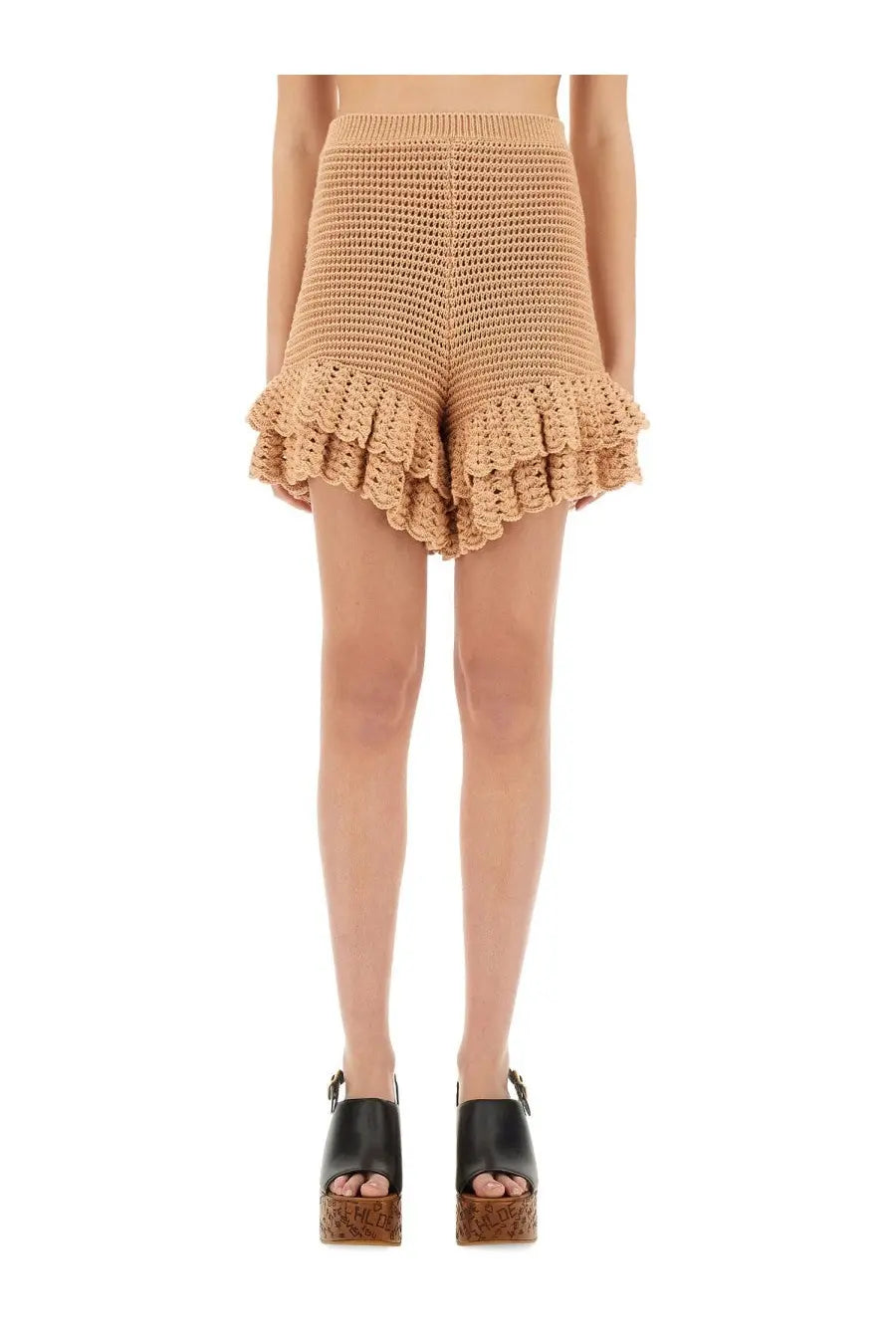Beige crocheted mini shorts by Chloé featuring knit fabric and a ruffled hem for a stylish summer look