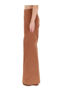 Chloé women’s brown flared pants featuring tan wide-leg trousers with a straight-cut silhouette and front seams