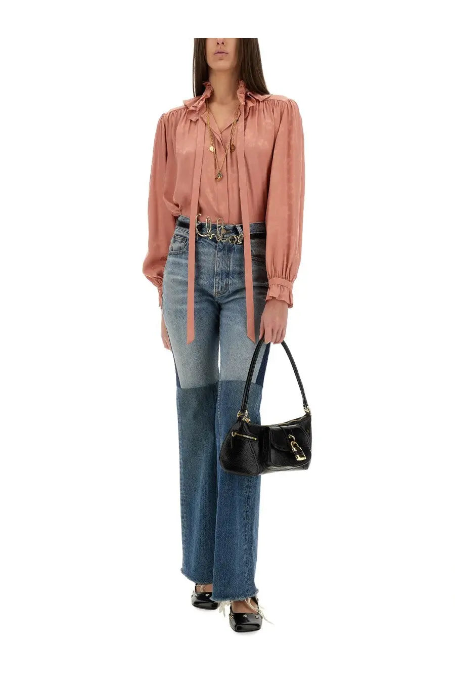 Black patent leather handbag with gold-tone hardware and distinctive buckle closure paired with chloé blue silk blouse