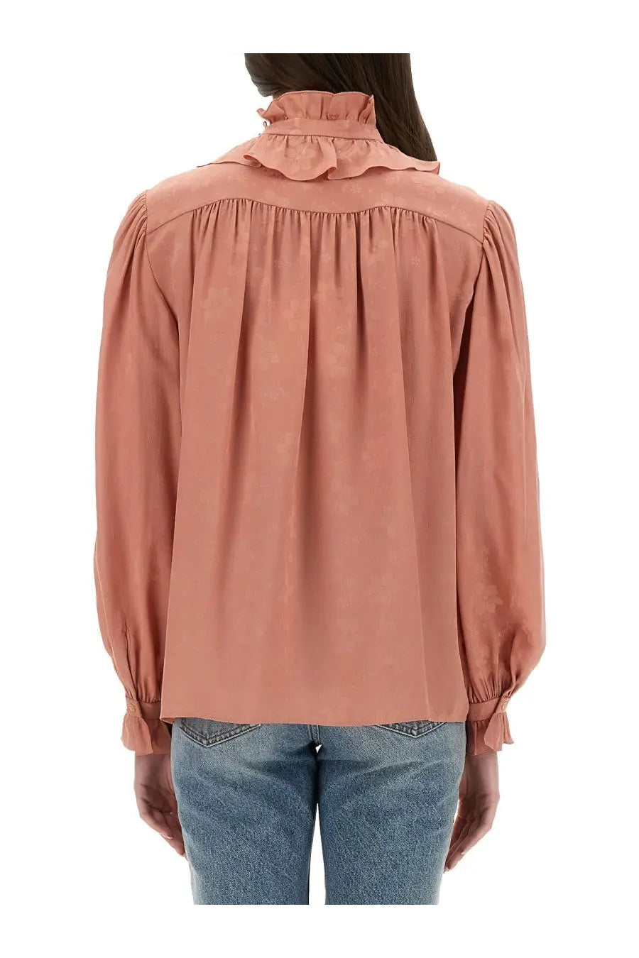 A soft rose-colored blouse with ruffled collar and puffed sleeves made from lightweight silk jacquard fabric