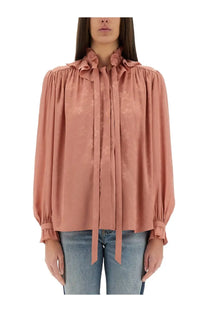 Chloé women’s fluid silk jacquard blouse in soft rose with delicate floral pattern and ruffled neckline and cuffs