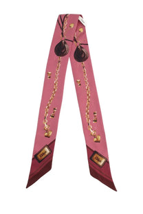 Chloé women’s pink silk scarf with gold chain pendant print and Chloé branding on the ends