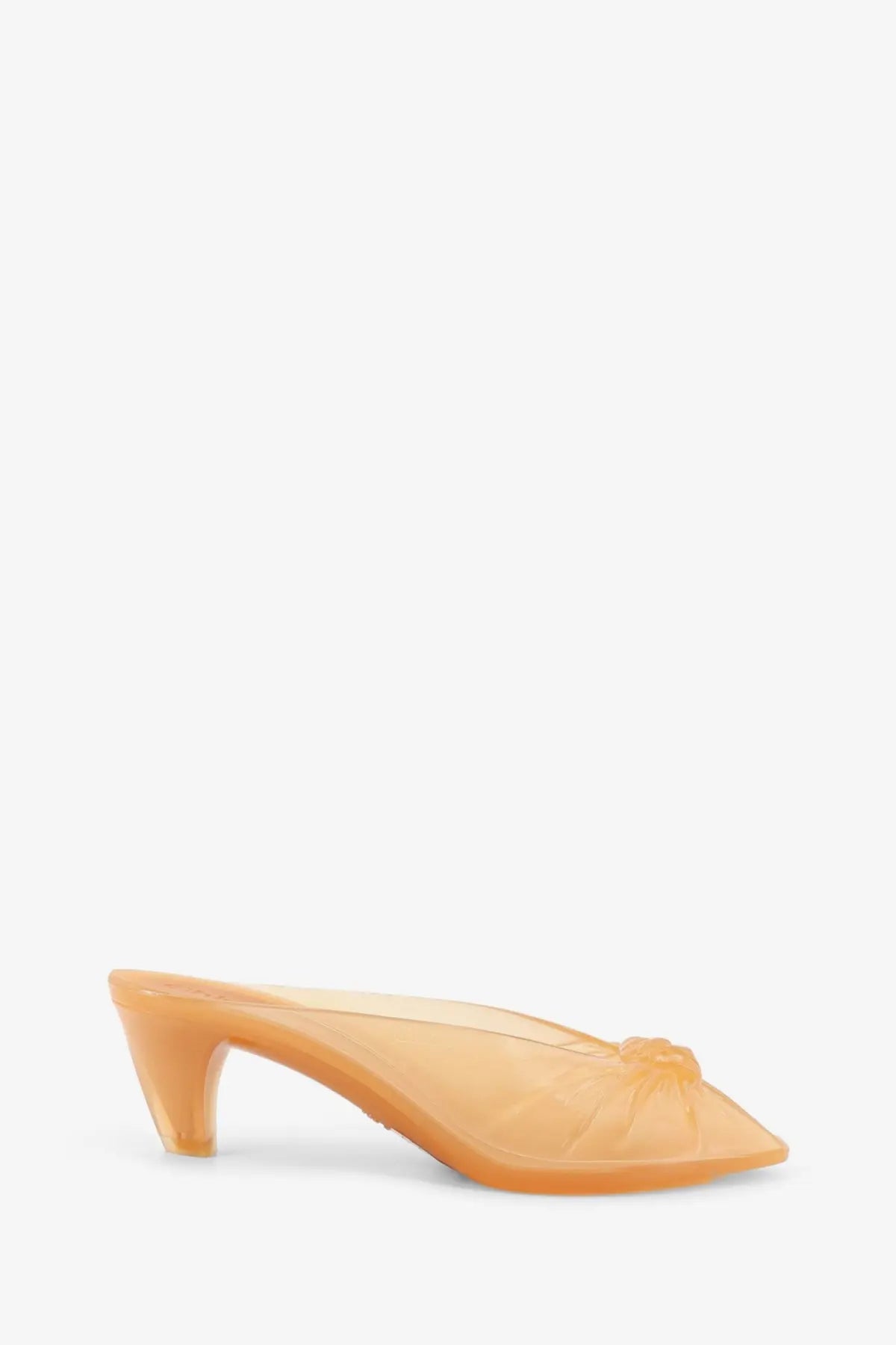 Chloé women’s transparent orange jelly mule sandals with molded heel and decorative bow at the toe in tpu material