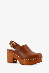 Chloé women’s brown leather clog with wooden block heel and gold-tone studs along the toe