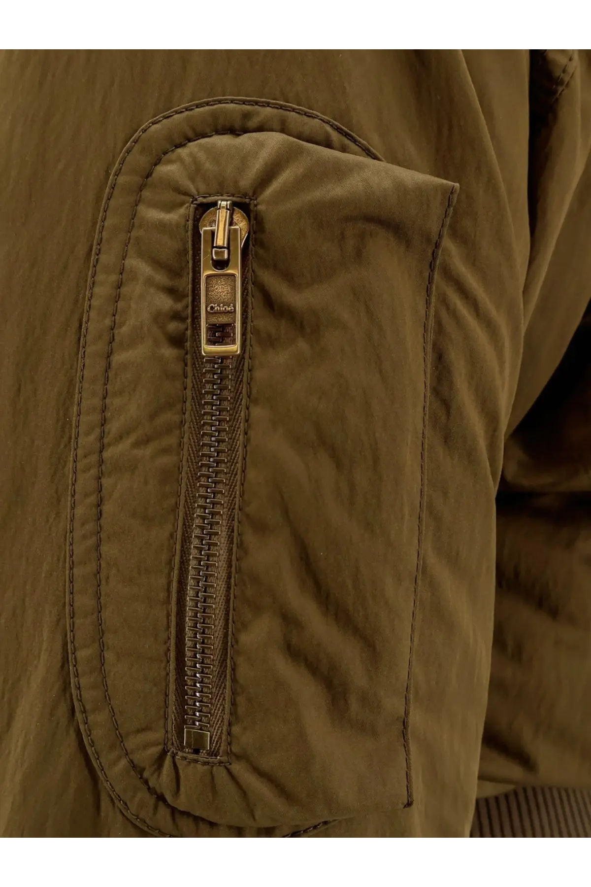 Chloé women’s olive green nylon bomber jacket with gold-tone zipper pull featuring the chloé brand name