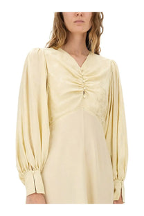 Chloé women’s ruched silk yellow dress in soft cream satin with long puffed sleeves and v-neckline button details