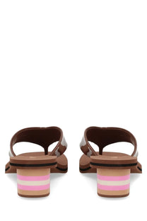 Chloé women’s brown flip-flops with glossy finish and striped pastel pink and beige wedge heels shown from the back