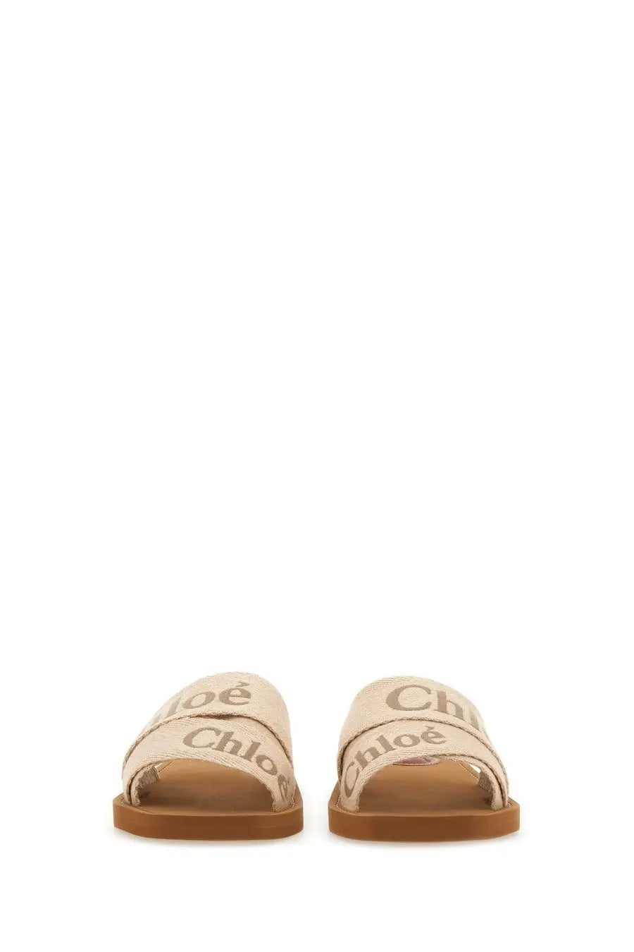 Beige chloé womens sandalo slide woody white sandals with tan rubber sole and brand name printed across straps