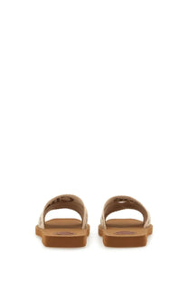 Chloé women’s sandalo slide woody white tan leather sandals with minimalist design and embossed logo on strap