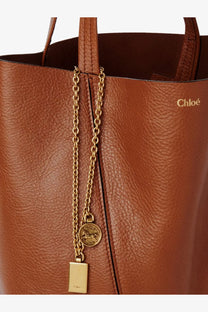 Brown leather chloé spin shoulder tote bag with gold-tone chain and charm for women