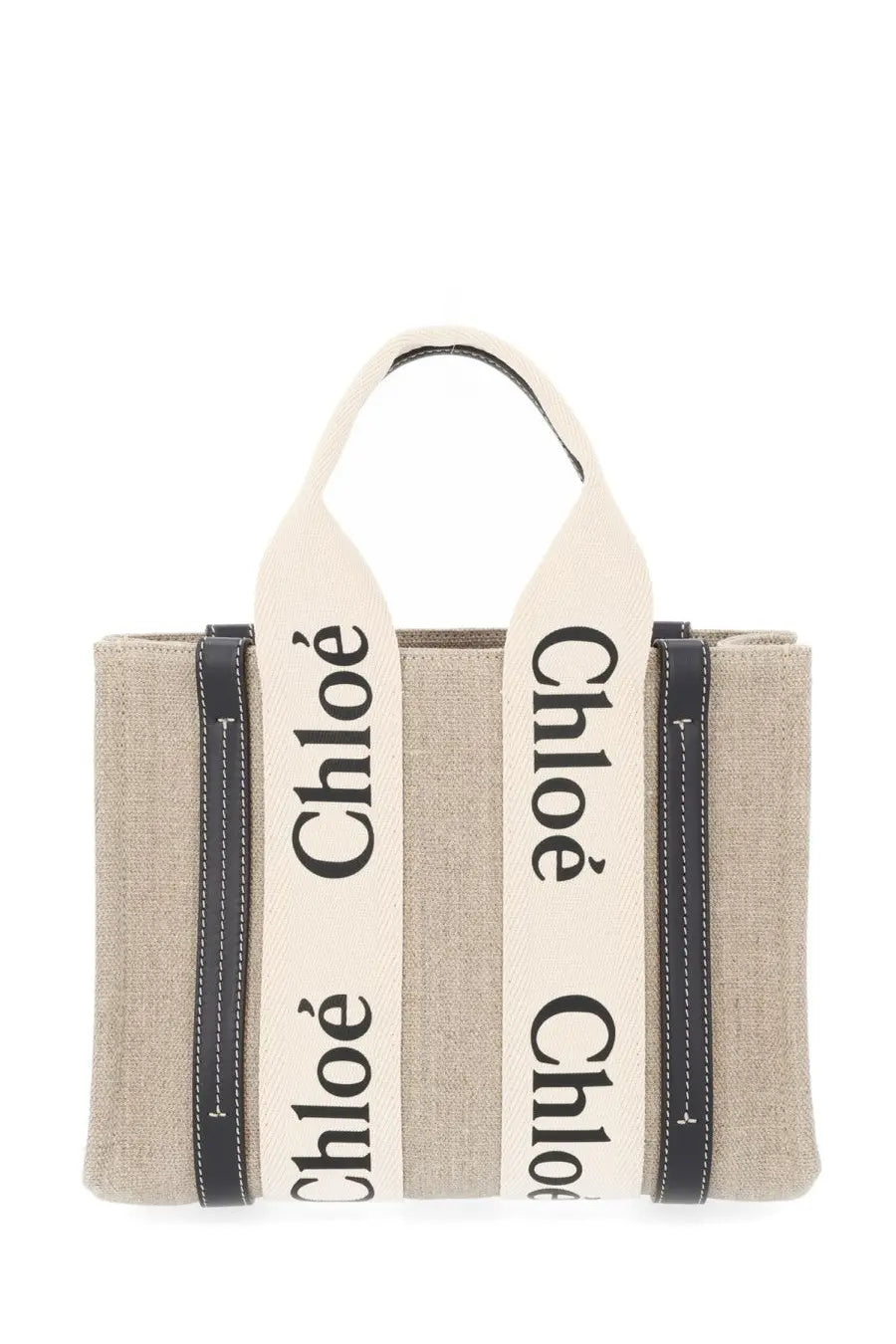 Beige canvas chloé women’s tote bag with cream handles and black leather trim featuring bold black lettering