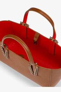 Christian Louboutin women’s cabata studded leather crossbody bag in beige tan leather with red interior and gold-tone spikes