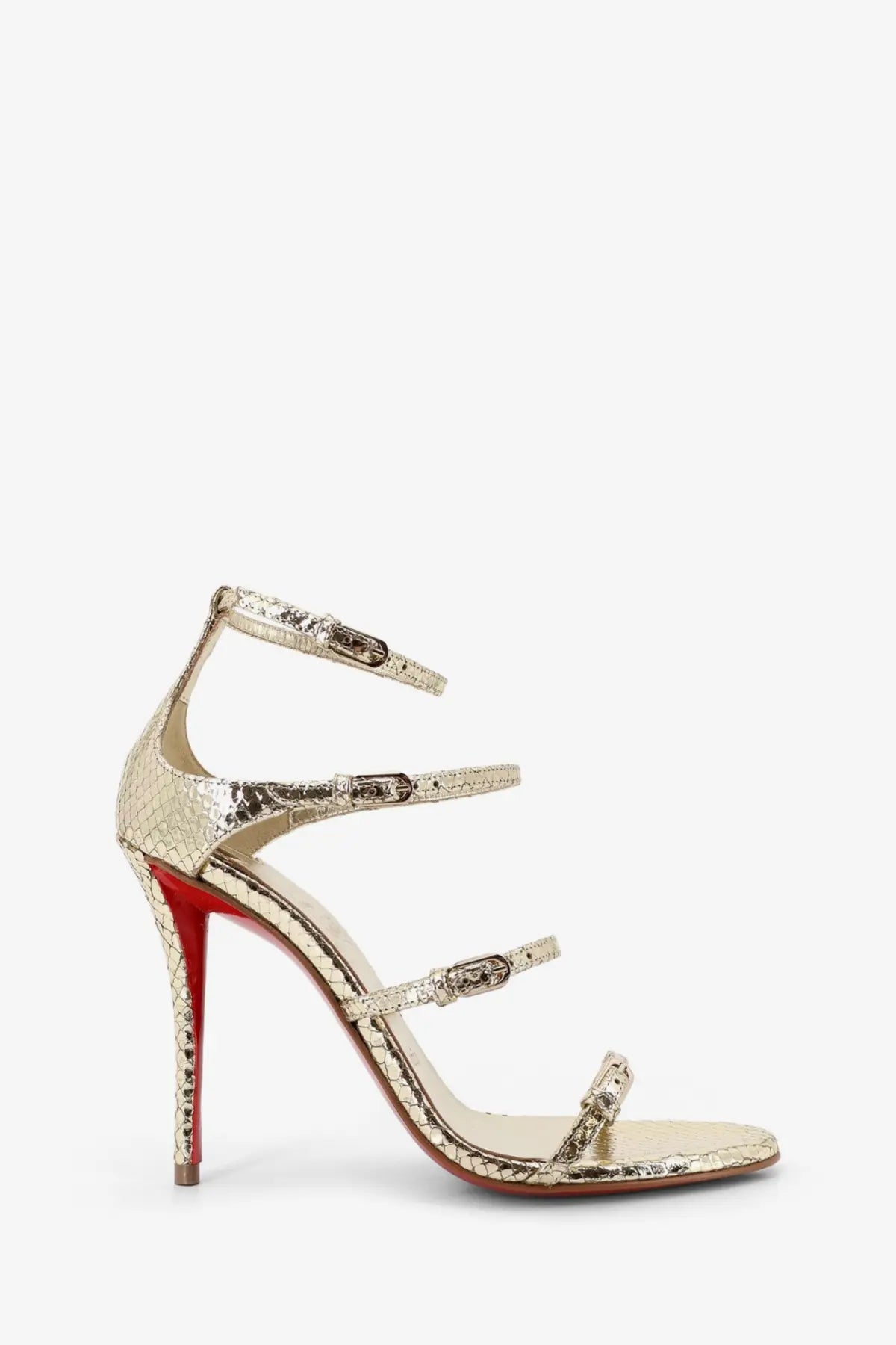 Christian Louboutin women’s millennium python leather sandal in gold with snake print straps and signature red sole