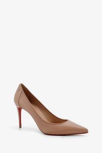 Beige leather christian louboutin pump with signature red sole and slender heel from women’s sporty kate collection