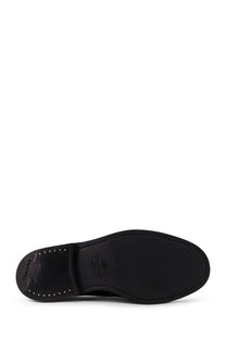 Back side of churchs men’s shannon black leather shoe sole with stitched edges and branded logo on the heel