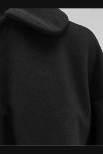 Black fleece-lined hooded coat by Comme Des Garcons Play with soft textured fabric and relaxed fit