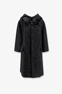Comme des garcons play women’s wool coat white featuring a black textured coat with ruffled satin collar and buttons