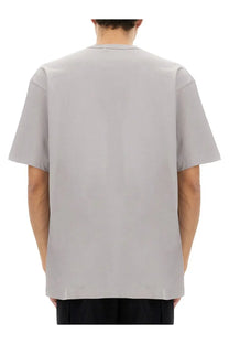 Comme Des Garcons shirt men’s gray minimalist crewneck t-shirt with relaxed fit and subtle seam detailing