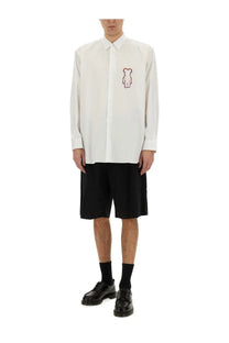 Comme des Garcons shirt men’s white poplin long-sleeved button-up with small embroidered bear on left chest
