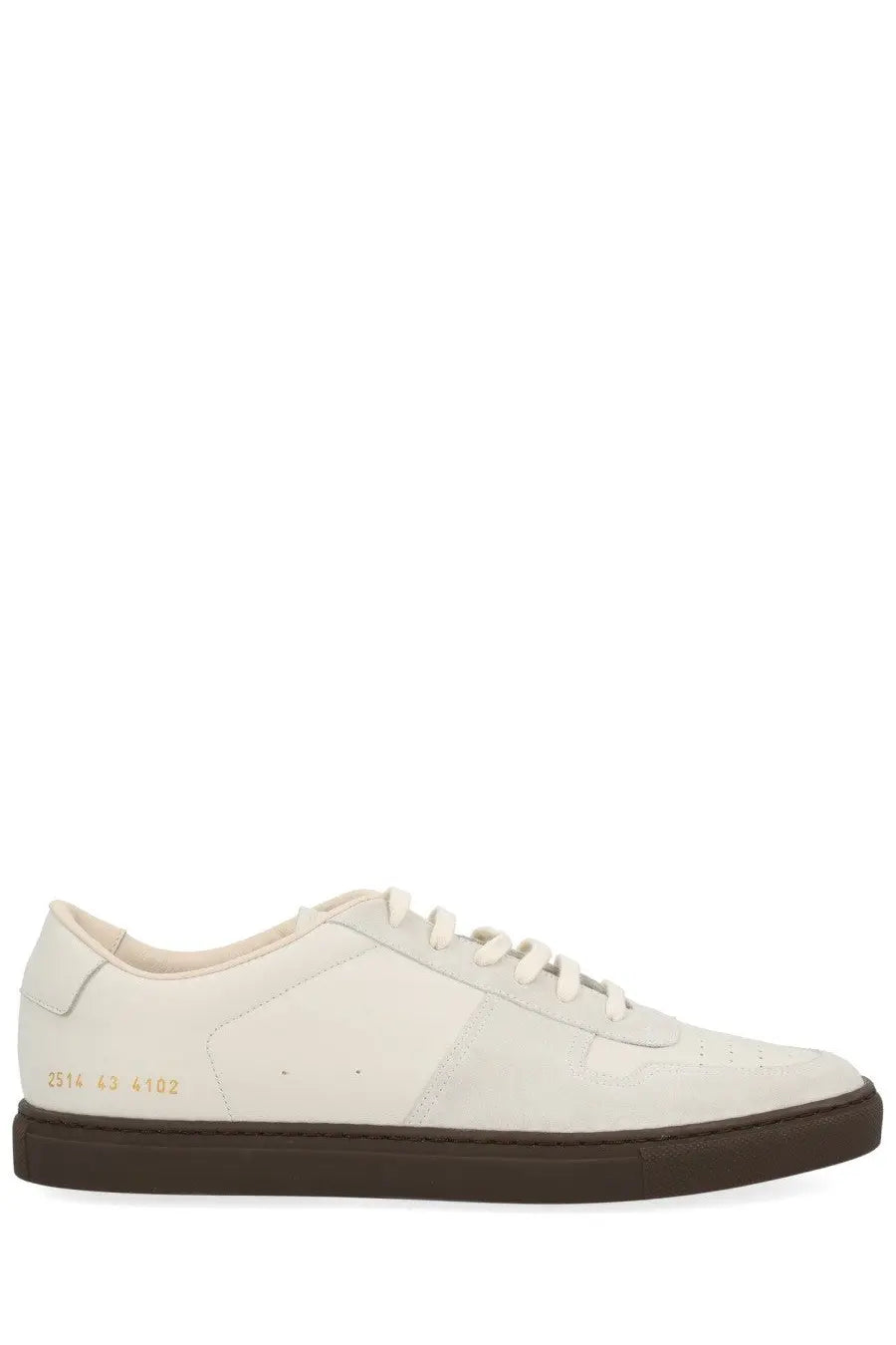 White leather low-top common projects men’s bball slim sneaker with dark brown rubber sole and gold branding on the heel back view