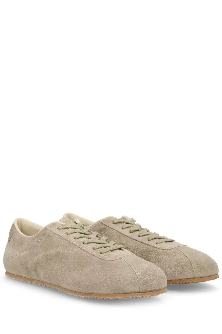 Common Projects men’s sneaker in beige suede with matching laces and light brown rubber sole low top design